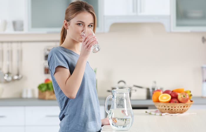 women drinking water healthy liver detox 700