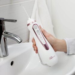 Máy tăm nước cầm tay Waterpik Cordless Advanced Water Flosser (White Pink) 23 may tam nuoc cam tay waterpik cordless advanced water flosser white pink kl